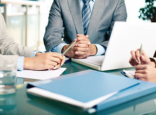 close-up-executives-sitting-table.jpg