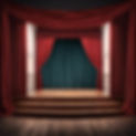 a small stage with a red curtain