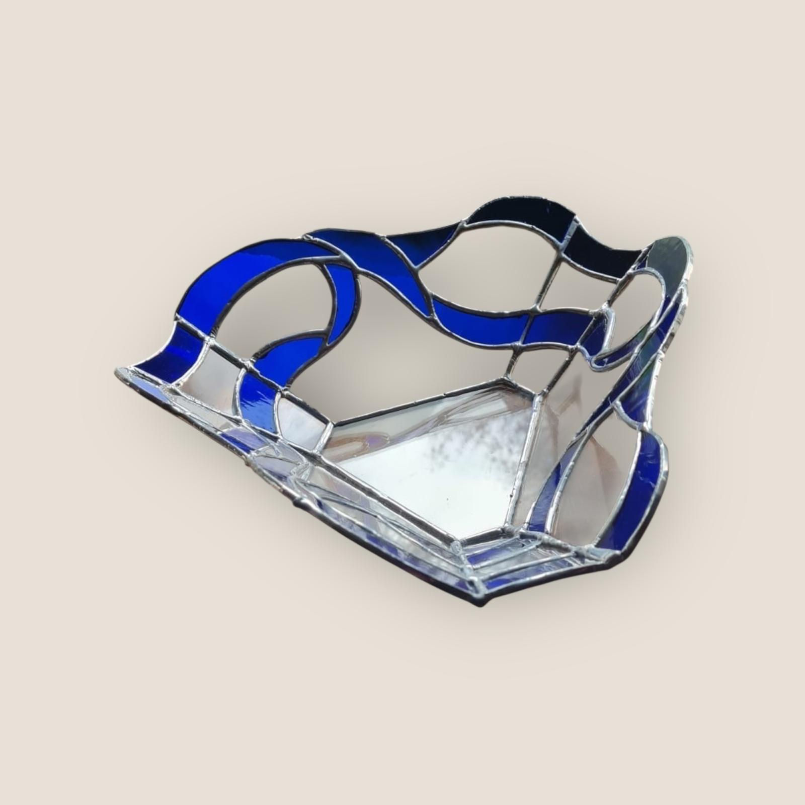 Handmade stained glass bowl with cobalt blue ribbon rim and clear base