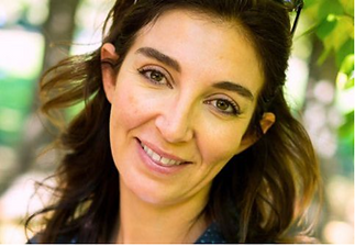 Smiling brunette woman with brown eyes