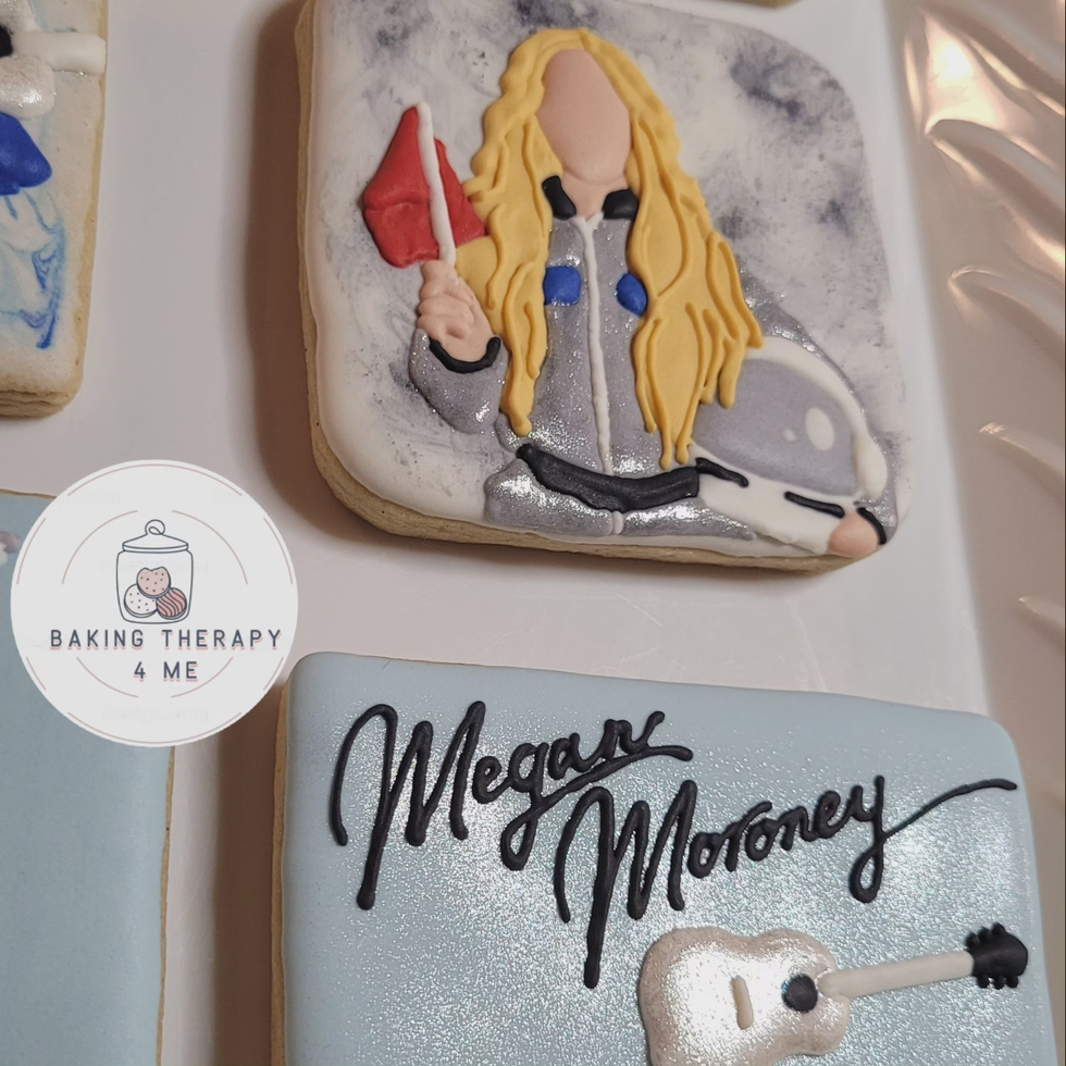 Megan Moroney and astronaut decorated cookies