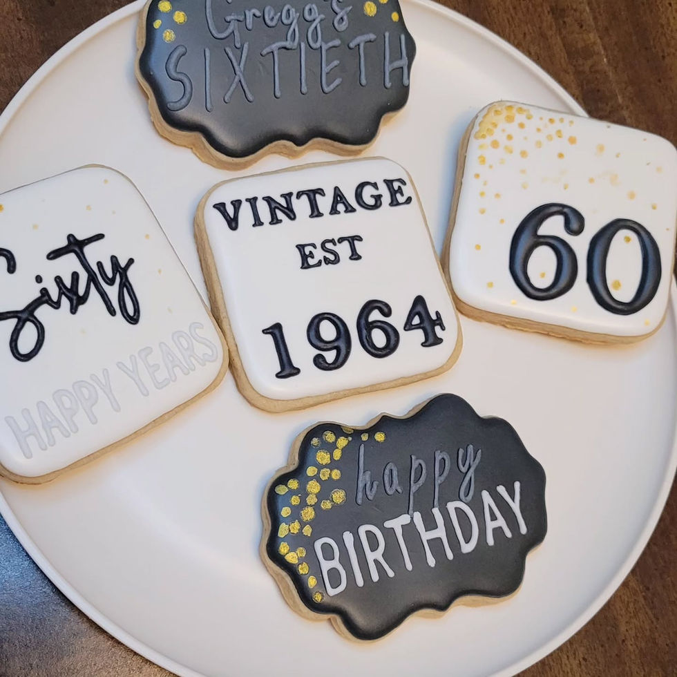 Cookies with text reading Sixty, Happy Birthday, Vintage Est 1964 and 60.