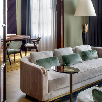 Arcahorn end table in Makassar ebony veneer from their Keplero Collection