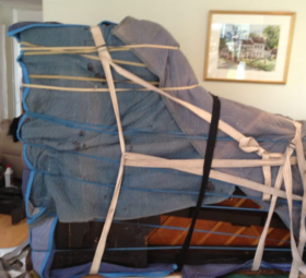 packing a piano so it is secure during moving.