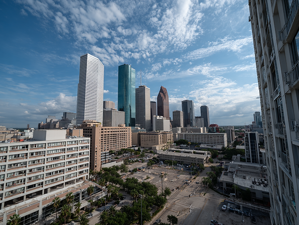 tlc3.__Houston_skyline_--ar_43_--raw_--profile_9vv5jex_--v_7_0874bb28-6b86-467c-bb3c-dcc02