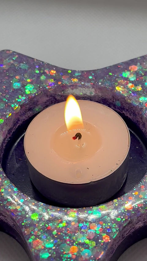 Thumbnail: Paarse sterrenlichtjeshouder