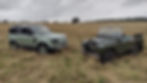 75th Anniversary Defender 90 in a field with 1949 Series 1 80"