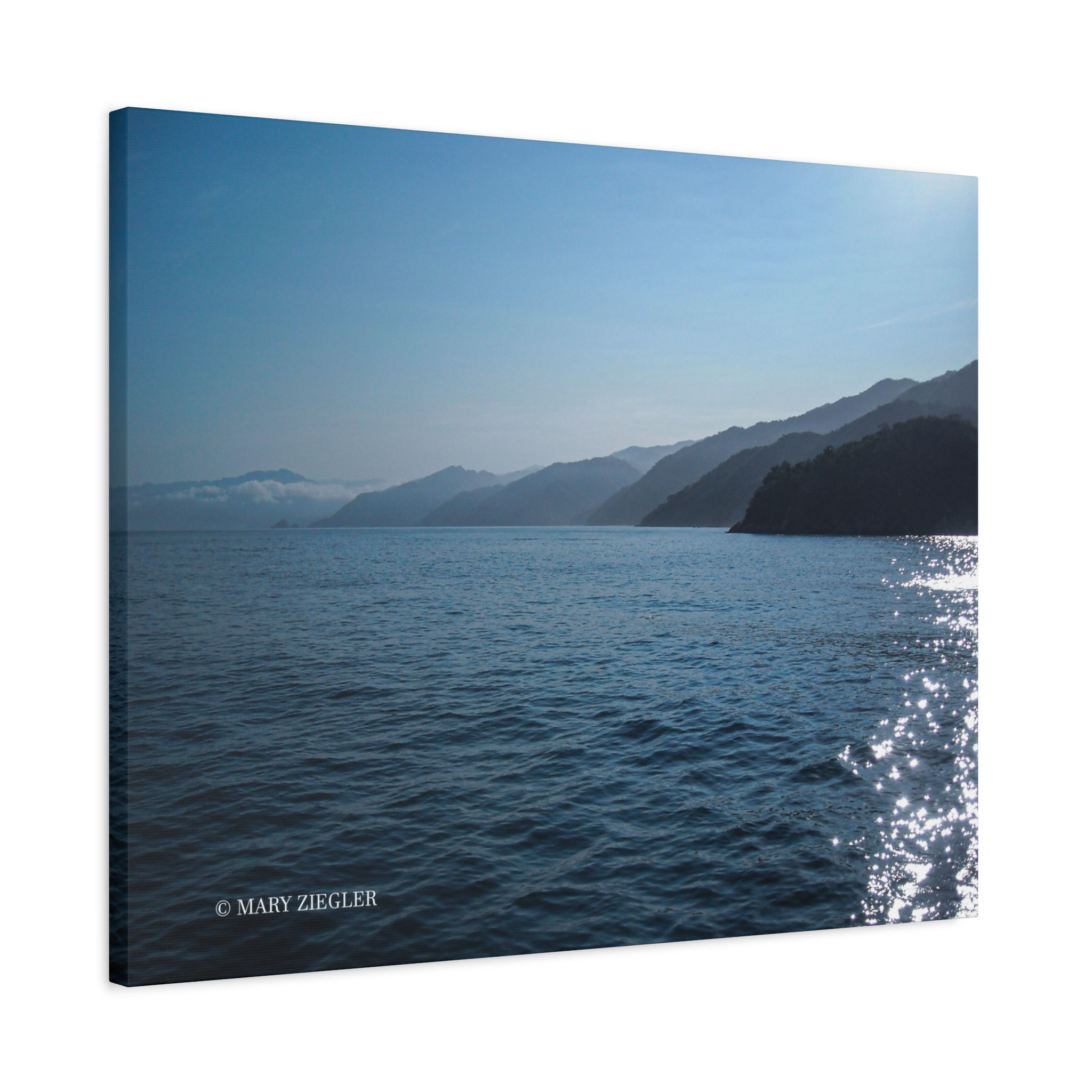 Chains of Mountains in Blue Waters Canvas Wrap