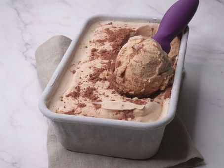 This creamy tiramisu ice cream combines mascarpone, espresso, rum, and cocoa in a smooth egg-free base inspired by the classic Italian dessert.