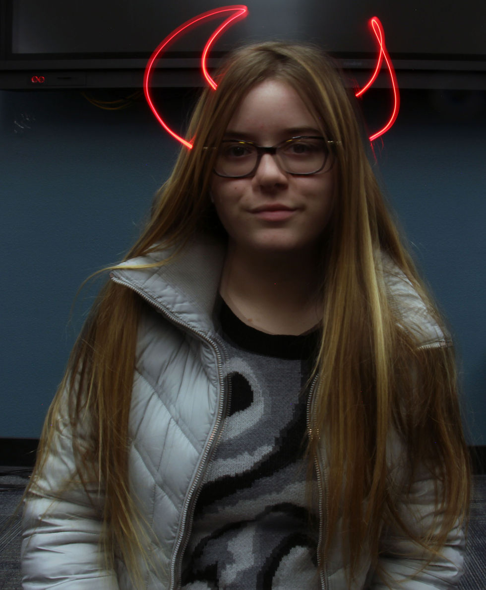 The Girl with Devil Horns
