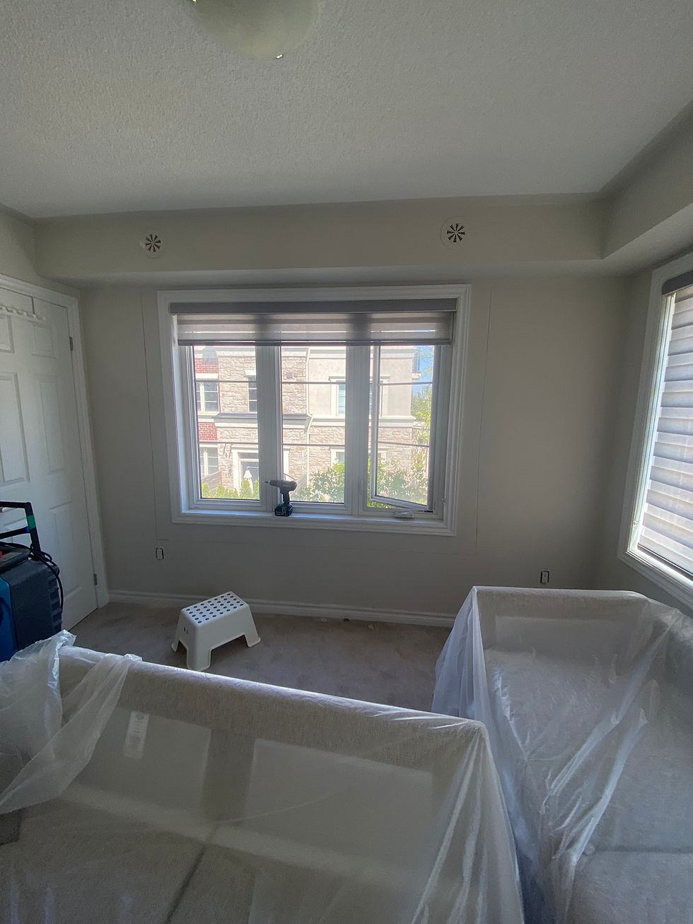Living room protected for interior demolition and repair work