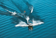 Person Water Skiing behind boat