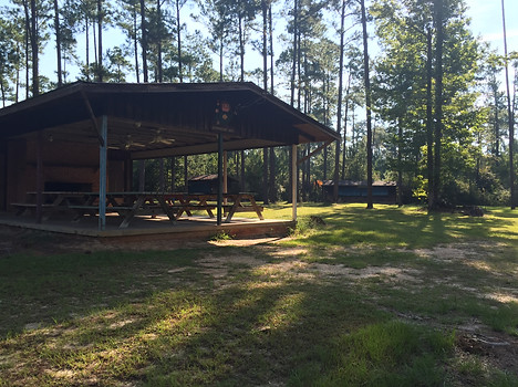 Pavilion surrounded by cabins.JPG