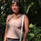 Thumbnail: Sleeveless brown gingham square-neck top styled outdoors with minimal, relaxed summer feel