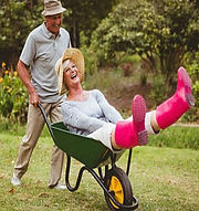 Couple enjoying yard without having to do the landscaping