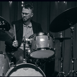 Photo of Paul Whitwood with a drumkit