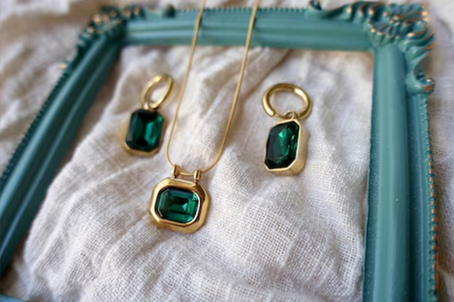 Handcrafted green gem pendant necklace by Wired Chaos Creations reflecting natural energy