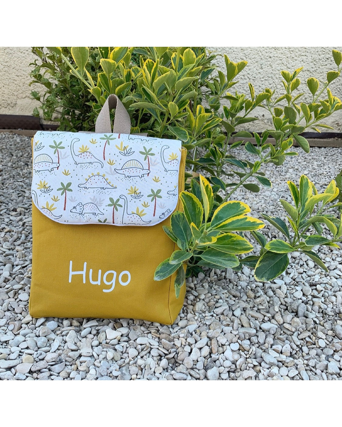 Sac à dos jaune motif dinos 