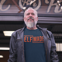 t-shirt-mockup-of-a-biker-guy-outside-a-