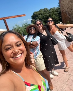 a group of women touring a winery