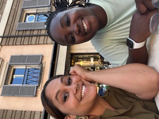 two wives at a restaurant in Italy 