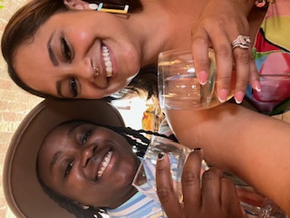 two wives drinking wine