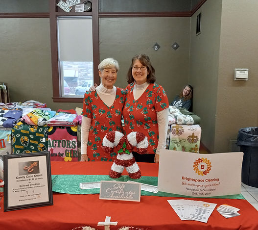 Two woman counting candy canes