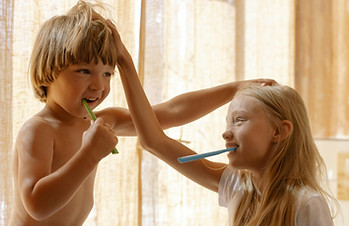 Family brushing teeth