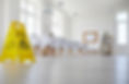 White school, college or university classroom with row of desks and chairs where janitoria