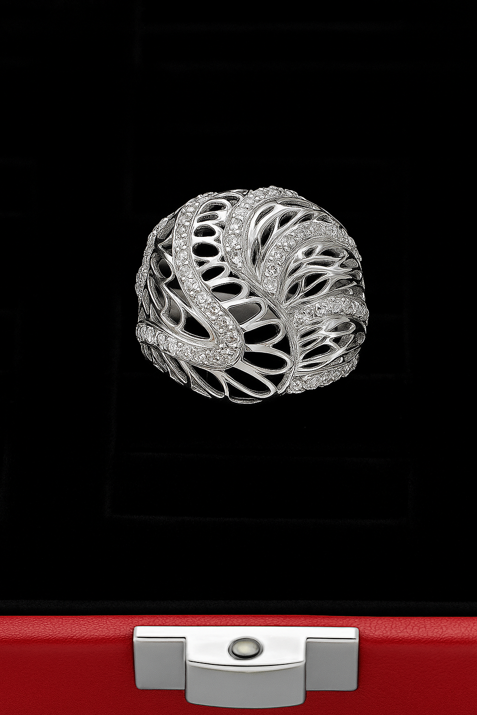 Silver ring with intricate design on black background, Shree Ganpati Jewellery.