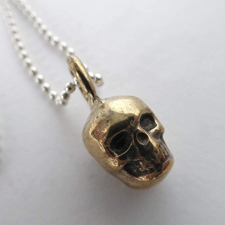 Thumbnail: Lil Skull Necklace - Bronze