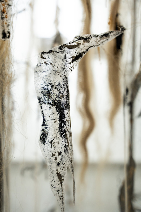 Zama Zama: Kilometres of Invisible Skins, 2025, metals, hemp threads, transparent textile, ink, acrylic, soil, mining dump, 220 × 100 × 200 cm (86.6 × 39.4 × 78.7 in), Johannesburg, South Africa