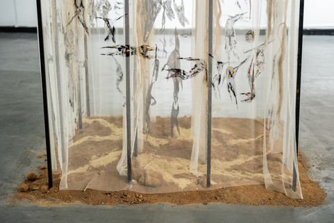 Zama Zama: Kilometres of Invisible Skins, 2025, metals, hemp threads, transparent textile, ink, acrylic, soil, mining dump, 220 × 100 × 200 cm (86.6 × 39.4 × 78.7 in), Johannesburg, South Africa