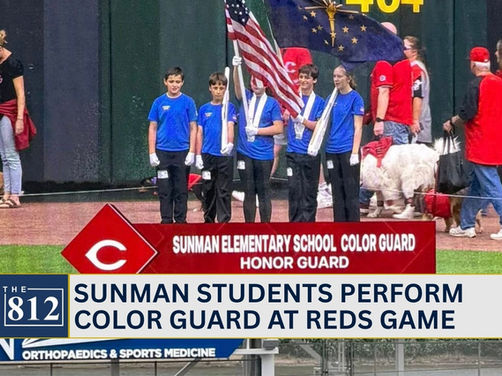 Sunman Elementary students perform color guard at Reds game 