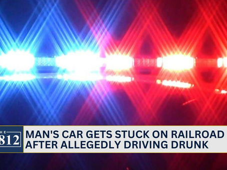 North Vernon man's car gets stuck on railroad after allegedly driving drunk