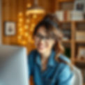 online therapy picture with a happy woman at the computer .jpg