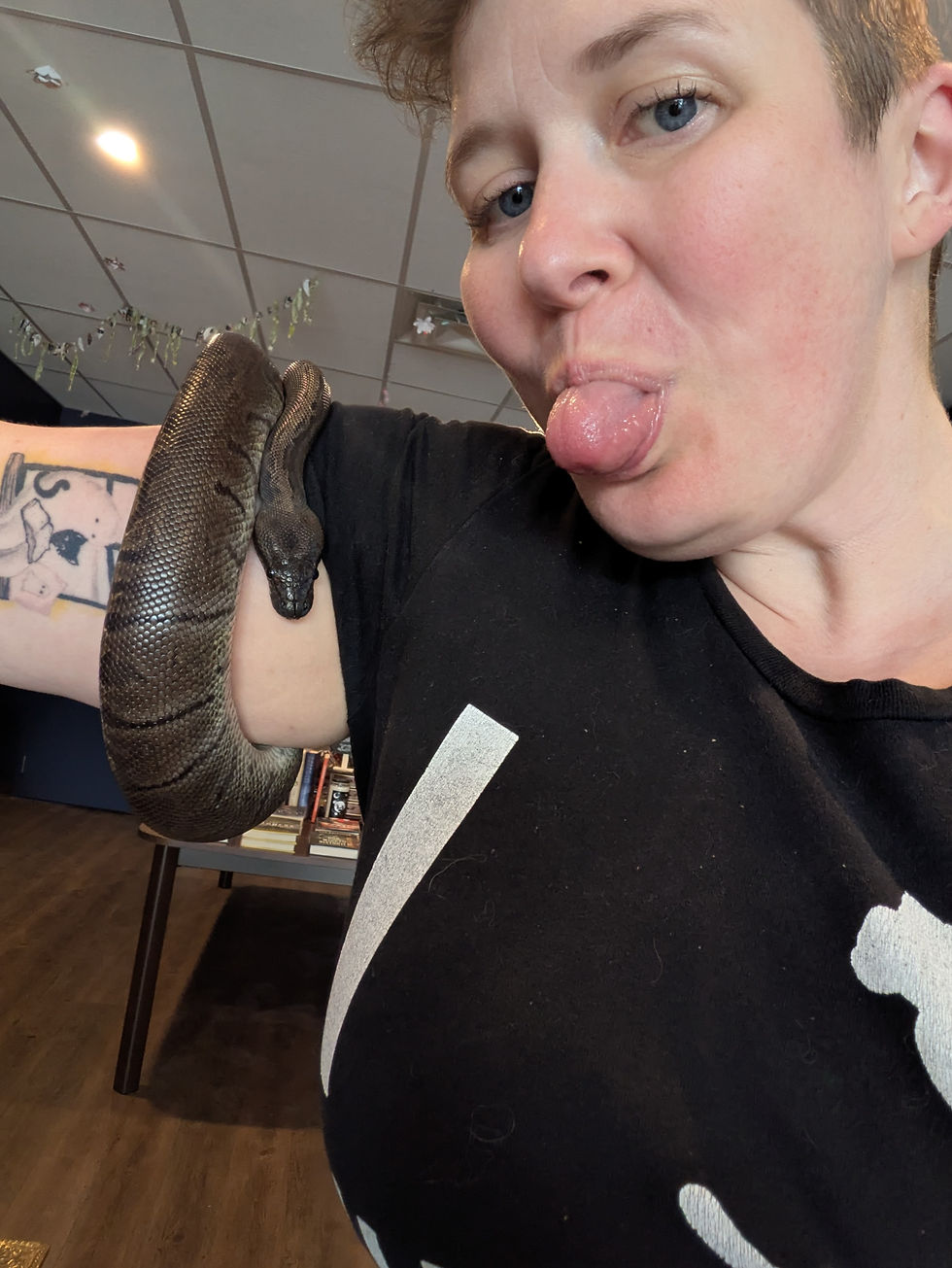 Chelsea McKee-Trenchard with a snake