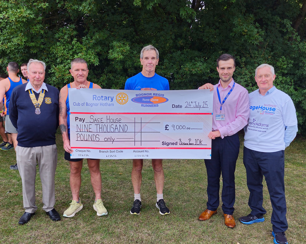 Bognor 10k presents a cheque to Sage House