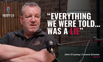 Close-up of John O'Looney speaking into a podcast microphone, with bold text reading “Everything we were told was a lie” and Society 2.0 branding.