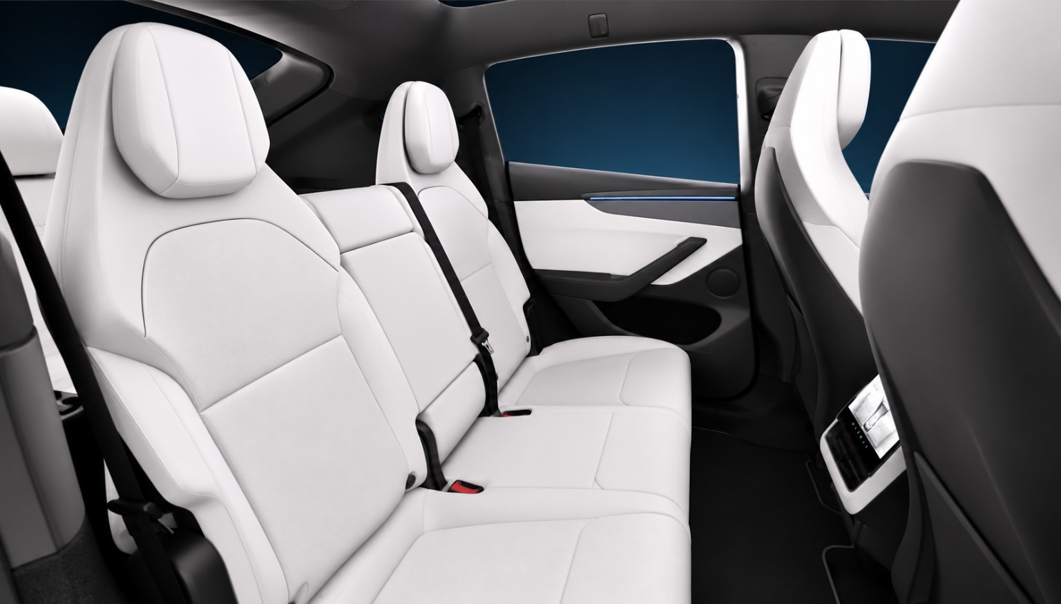 Tesla-style interior photograph: White-seat second row · Individual seats