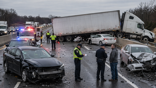 A multi-vehicle jackknife truck accident