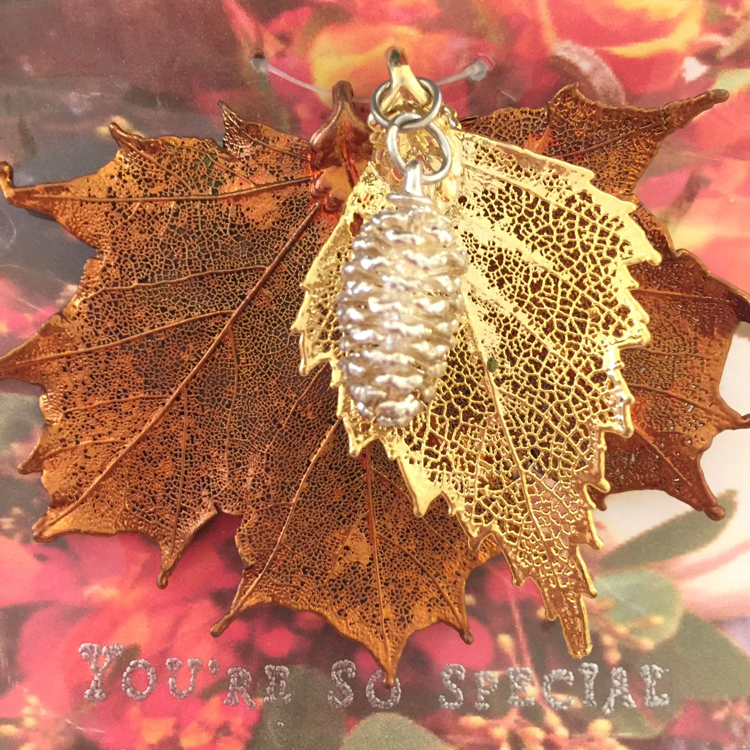 A Real Pinecone in Silver, Maple Leaf in Copper Patina & a Birch Leaf in Gold