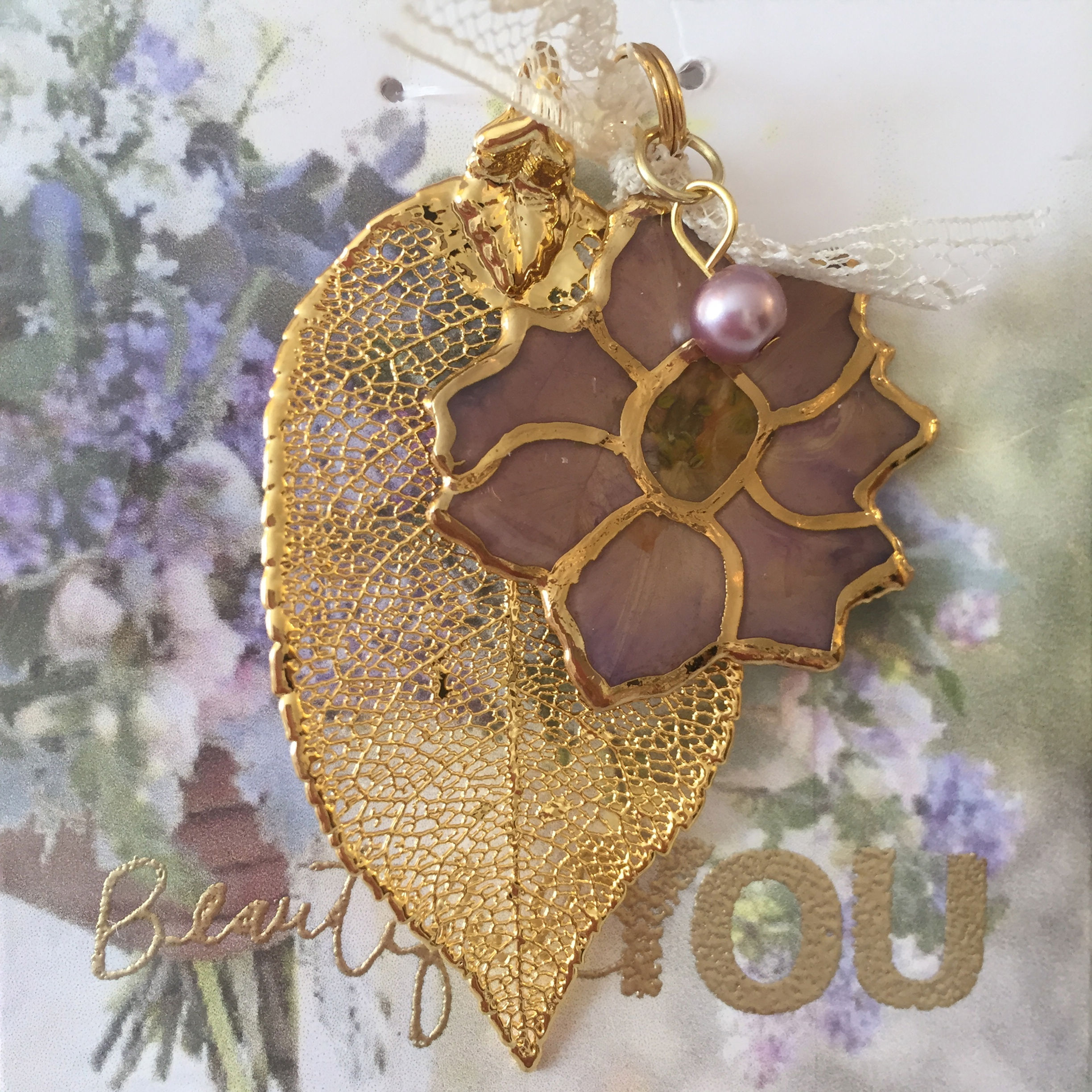 A Real Rose Leaf & a Lavender Larkspur Outlined Pearl/Lace in Gold