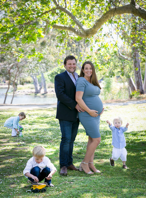 pregnant woman with her husband and three beautiful toddler boys during the maternity family photography session by Hyunah Jang photography in San Francisco Bay Area