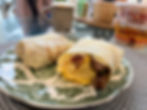 sausage, bacon, egg and cheese breakfast burritos with chipotle Bitchin sauce