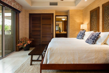 Bedroom at Luxury penthouse vacation rental home at Hualalai on the Big Island of Hawaii with ocean view