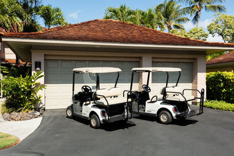 Golf carts at Luxury penthouse vacation rental home at Hualalai on the Big Island of Hawaii with ocean view