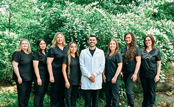 Team Photo White Flowers.jpg
