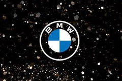 BMW logo on black, sparkly background