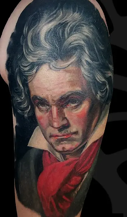 Color Realism arm tattoo of Bathoven portrait by Serjo bronfman at Serjo Tattoo Tel-aviv.
